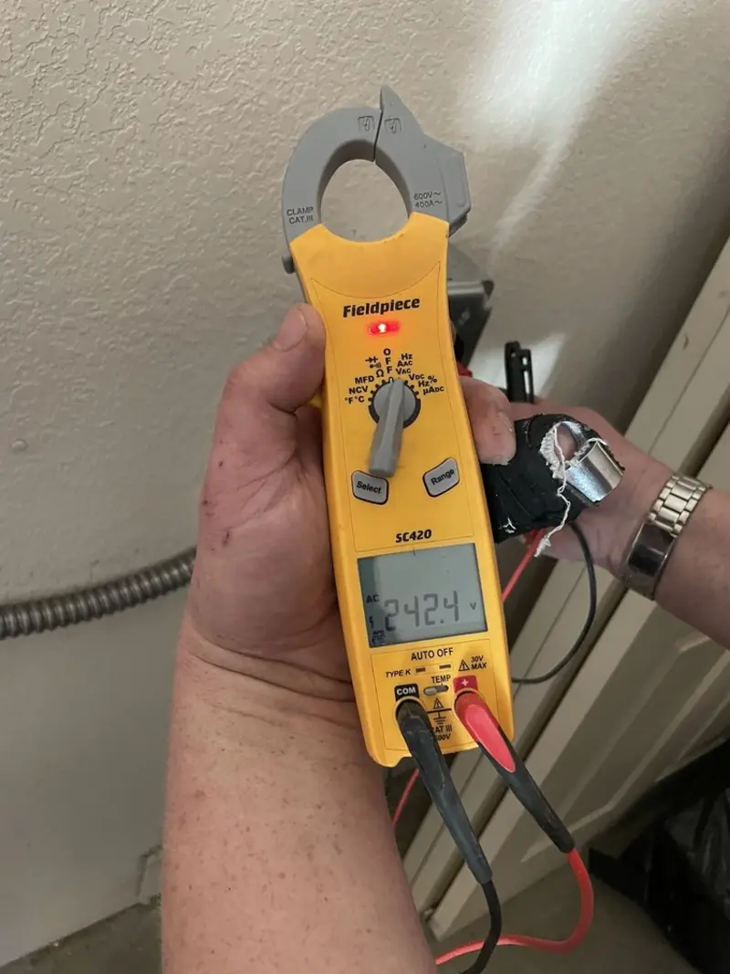 Voltage testing with clamp meter during Generator Installation in Reedley
